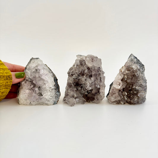 Self-standing amethyst geode crystal cluster from FoxlarkCrystals, showcasing vibrant purple crystals and natural rock formation.
