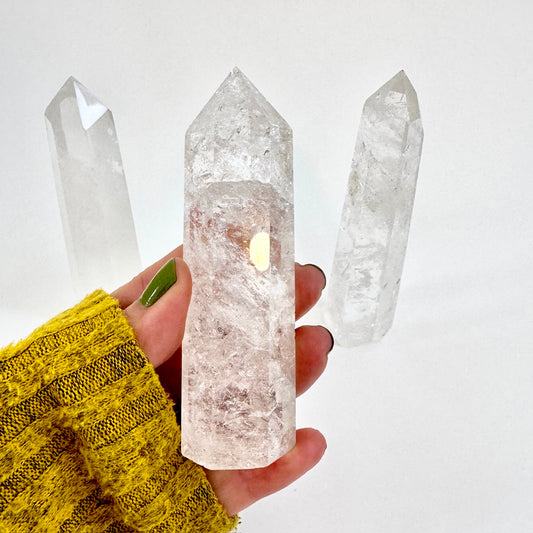 Self-standing clear quartz crystal point from FoxlarkCrystals, showcasing a natural transparent crystal with pointed tip and sturdy base.