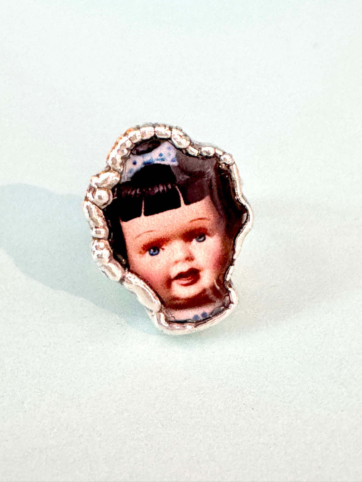 blue bow doll head ring, fine silver, size 9