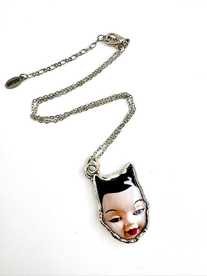 side eye doll head necklace, fine silver