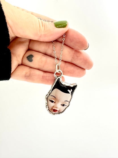 side eye doll head necklace, fine silver