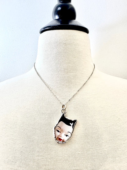 side eye doll head necklace, fine silver