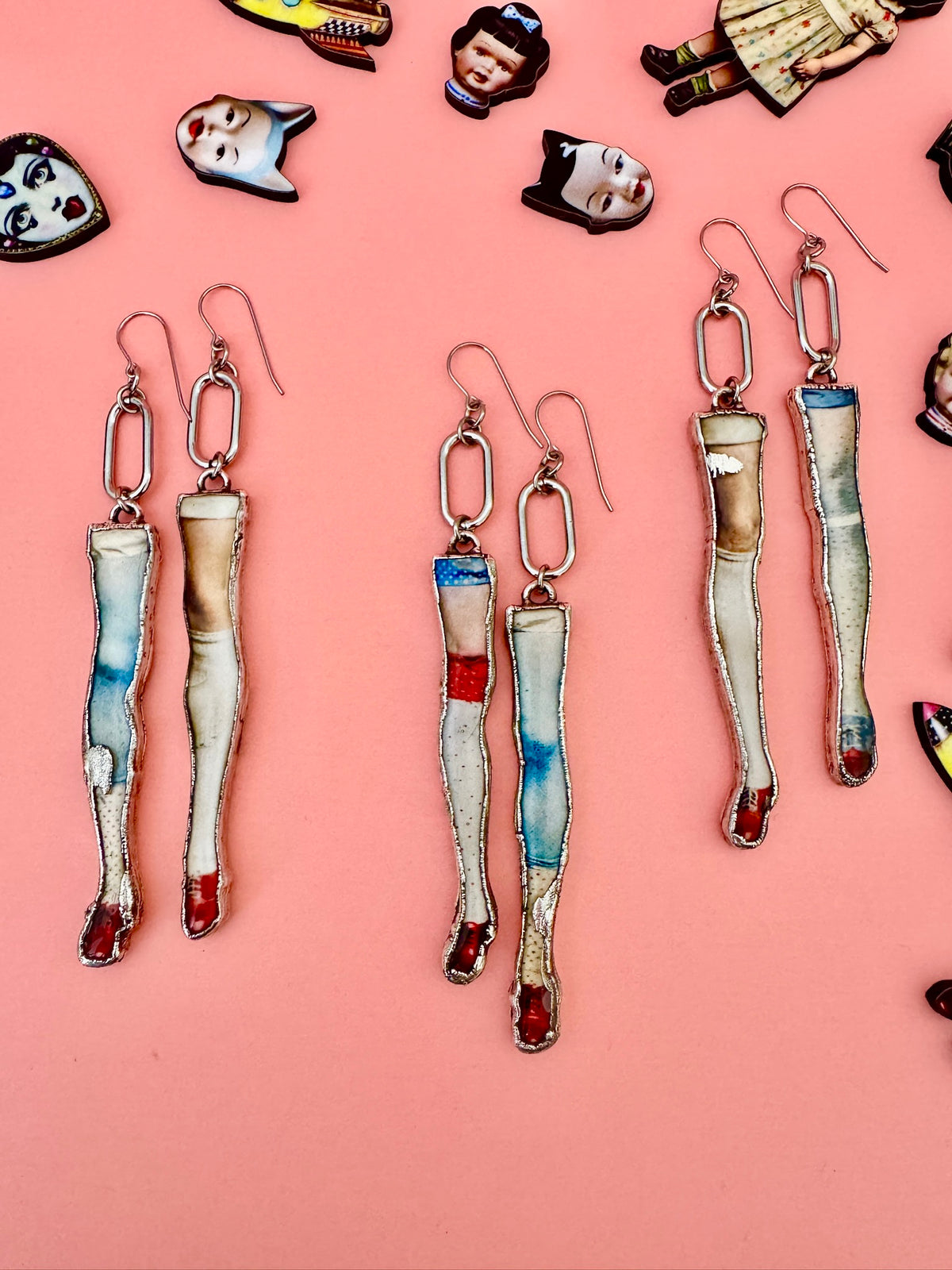 mismatched doll leg dangle earrings, fine silver