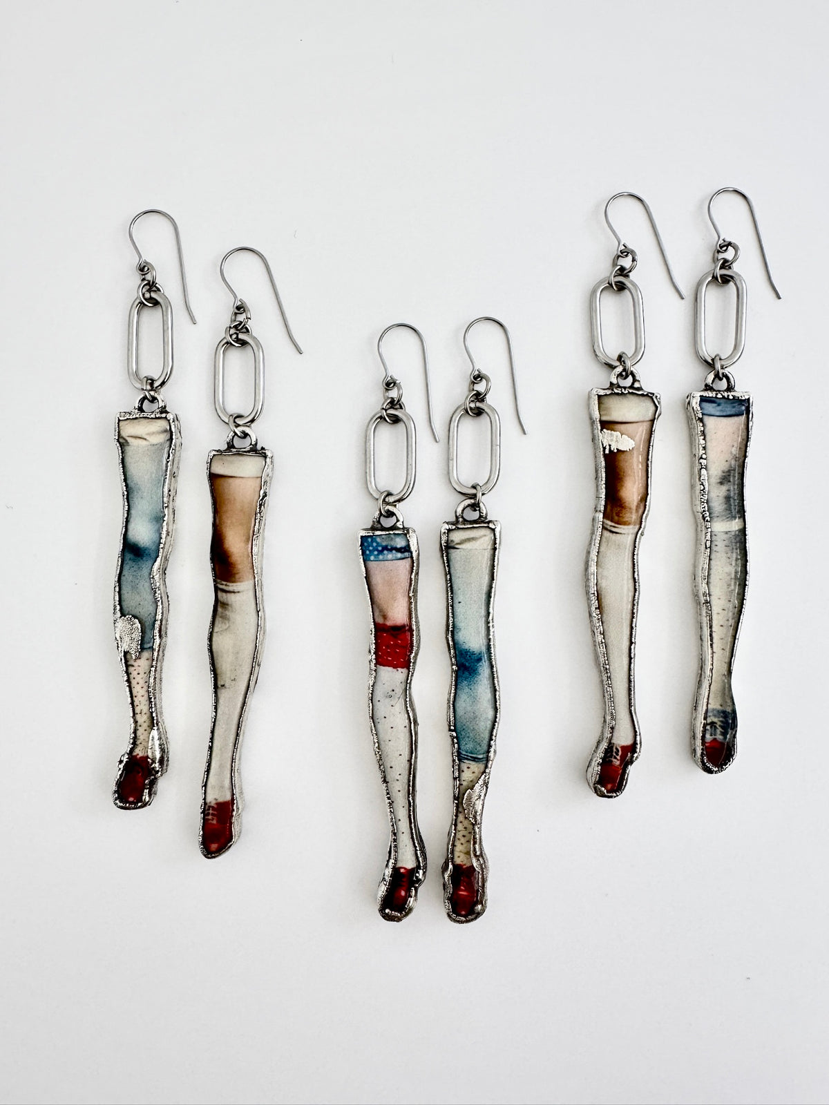 mismatched doll leg dangle earrings, fine silver