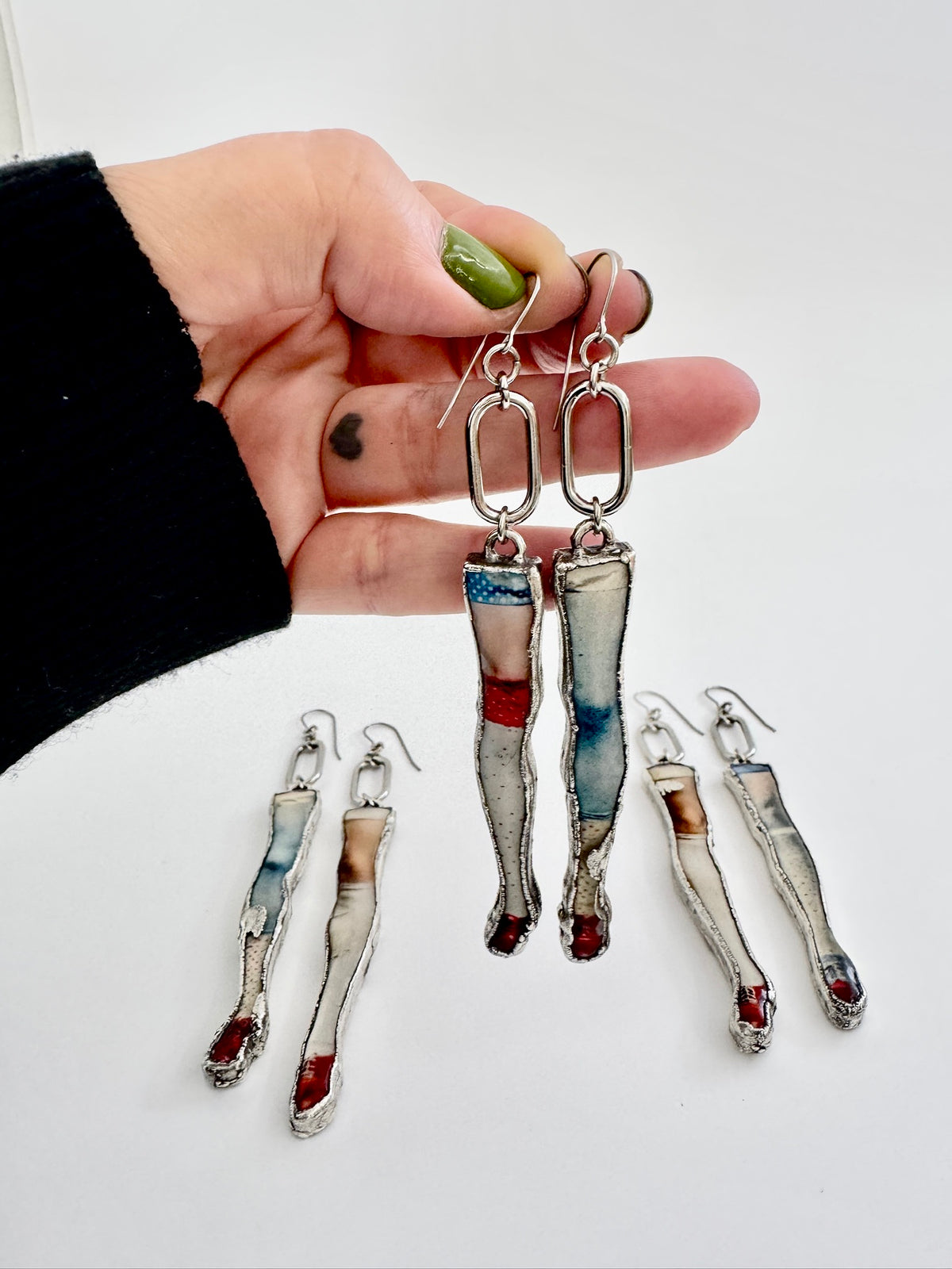 mismatched doll leg dangle earrings, fine silver